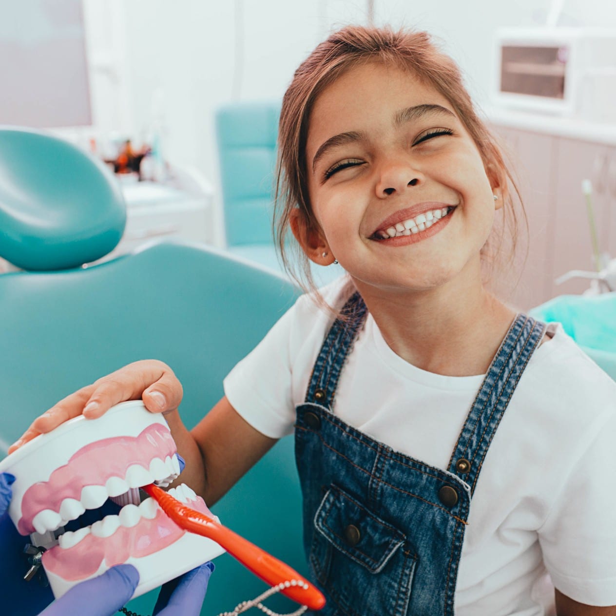Girl at her professional dental cleaning appointment in Griffin GA